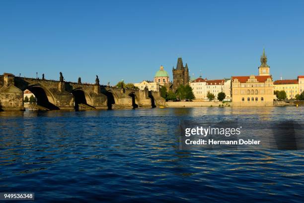 charles bridge, the vitava river and st. francis church, old town bridge tower, smetana museum, prague, czech republic - smetana museum stock pictures, royalty-free photos & images