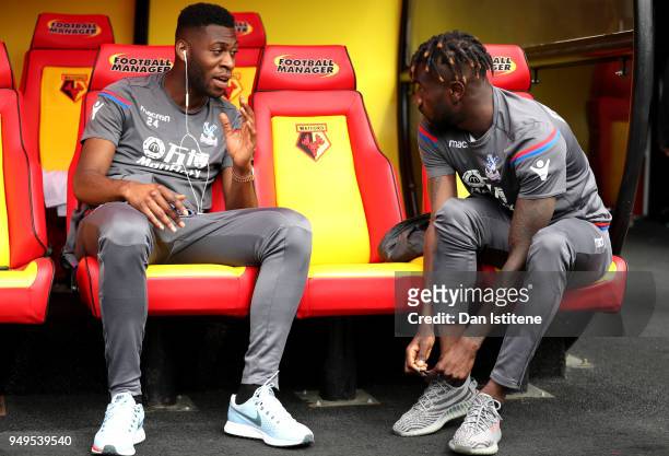 Timothy Fosu-Mensah of Crystal Palace talks to Pape Souare of Crystal Palace prior to the Premier League match between Watford and Crystal Palace at...