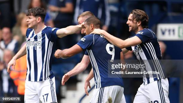 Jose Salomon Rondon of West Bromwich Albion celebrates with teammates after scoring his sides second goal during the Premier League match between...
