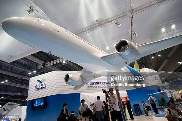 Model of the C919 jetliner made by Commercial Aircraft Corp. Of China is on display at the Asian Aerospace 2009 conference in Hong Kong, China, on...