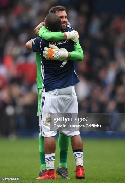 Ben Foster of West Bromwich Albion celebrates with Jose Salomon Rondon of West Bromwich Albion after the Premier League match between West Bromwich...