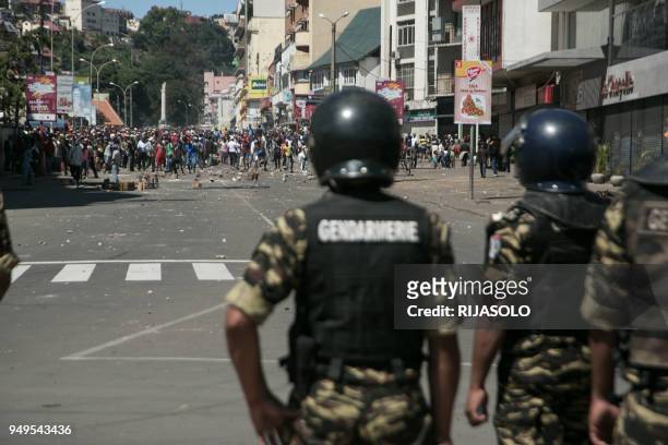 Police clash with protestors during a opposition demonstration against a draft electoral law adopted by Madagascar's National Assembly on April 21,...