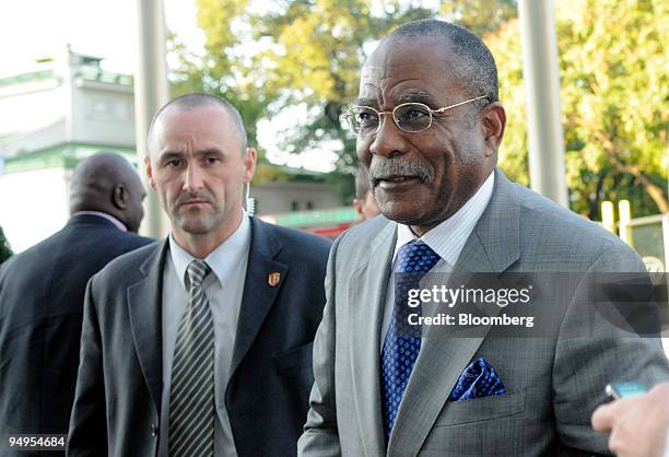 Jose Maria Botelho de Vasconcelos, Angola's oil minister and OPEC president, arrives at his hotel prior to the 154th Organization of Petroleum...