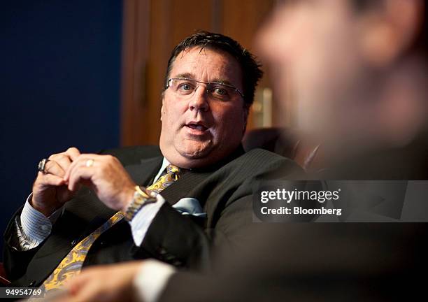 Chuck Eddy of Bob and Chuck Eddy's Chrysler, Dodge, Jeep dealership in Youngstown, Ohio, left, speaks with Representative Tim Ryan, a Democrat from...