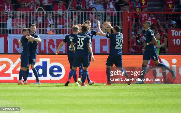 Nikola Dovedan, Denis Thomalla, Marcel Titsch-Rivero, Kevin Lankford, Norman Theuerkauf and Robert Glatzel of 1. FC Heidenheim celebrate after...
