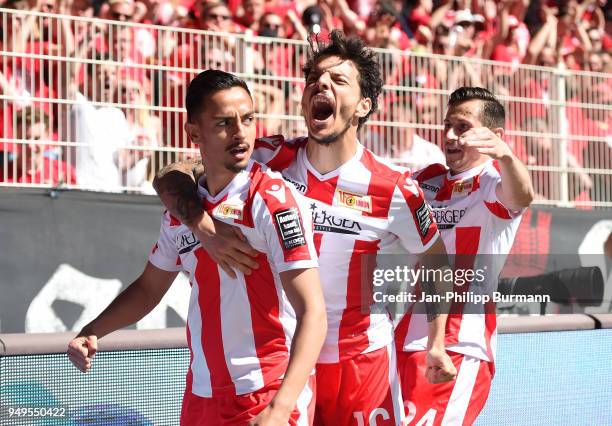 Kenny Prince Redondo, Philipp Hosiner and Steven Skrzybski of 1 FC Union Berlin celebrate after scoring the 1:1 during the match between Union Berlin...