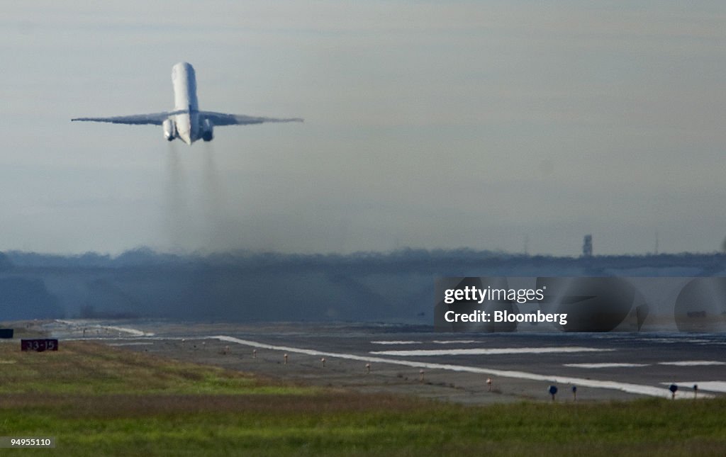 Exhaust is seen from a Delta Airlines Inc. airplane as it ta