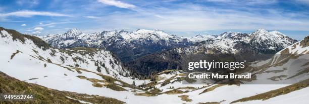 panoramic view, radtstaetter tauern, mountains, austrian central alps, spring snow melt, obertauern, salzburg state, austria - obertauern stock pictures, royalty-free photos & images