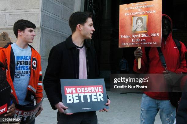 An organizer organizes a student led walkout rally at City Hall in Philadelphia on April 20, 2018.