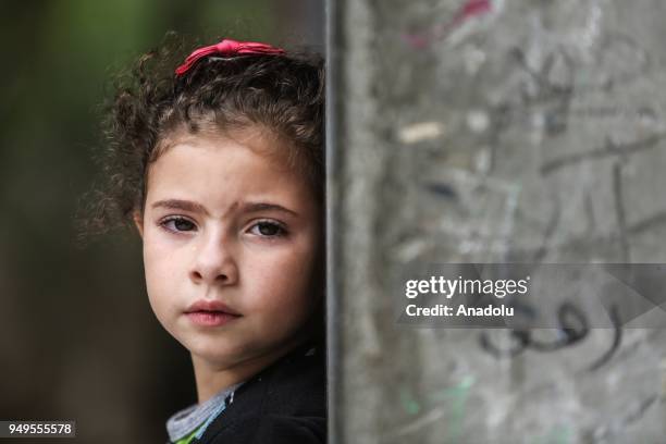 Girl cries during funeral of 29-year-old Saad Abdul Majid Abdul-Aal Abu Taha who shot dead by Israel forces during border rallies in Gaza, on April...