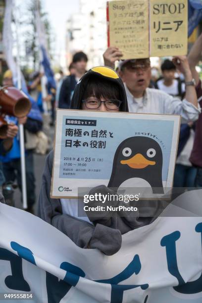 Activist holds placard during the Annual Earth Day in Shibuya district, Tokyo on 21 April 2018. Environmental activists commemorated Earth Day with a...