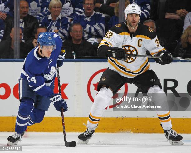 Zdeno Chara of the Boston Bruins skates against Kasperi Kapanen of the Toronto Maple Leafs in Game Four of the Eastern Conference First Round in the...