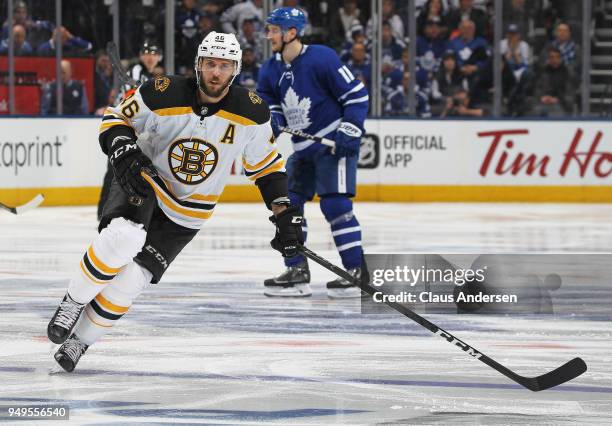 David Krejci of the Boston Bruins skates against the Toronto Maple Leafs in Game Four of the Eastern Conference First Round in the 2018 Stanley Cup...