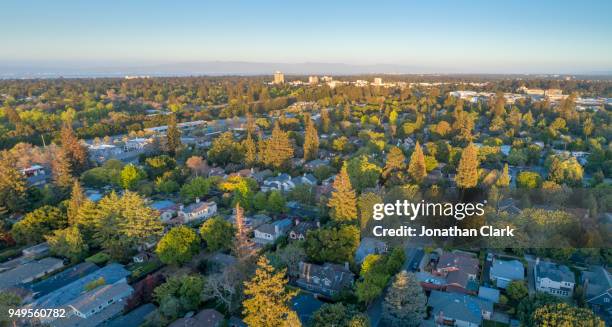 aerial: menlo park suburbs in silicon valley at sunset - silicon valley aerial stock pictures, royalty-free photos & images