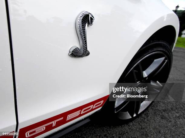 The Cobra logo is photographed on the side of a 2010 Ford Shelby Cobra GT 500 in Highland Falls, New York, U.S., on Tuesday, July 7, 2009. The Ford...