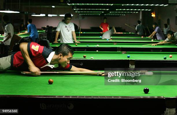 People play snooker in Kota Bharu, Kelantan, Malaysia, on Thursday, Sept. 10, 2009. Growing Islamic conservatism in Malaysia's Kelantan state and...