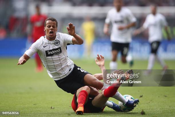 Timothy Chandler of Frankfurt is challenged by Matthew Leckie of Berlin during the Bundesliga match between Eintracht Frankfurt and Hertha BSC at...
