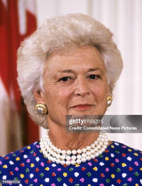 View of First Lady Barbara Bush as she hosts Presidential Medal of Freedom ceremony in the East Room of the White House, Washington DC, July 6, 1989.