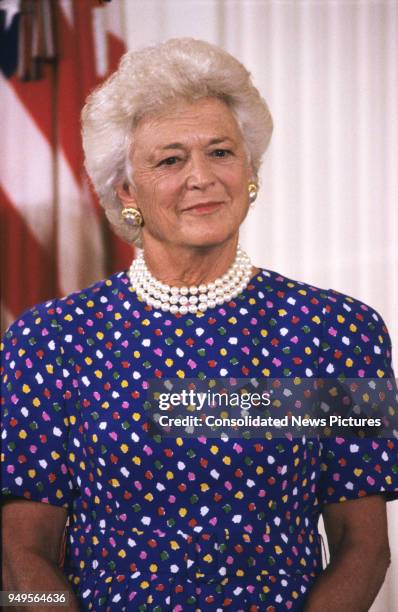 View of First Lady Barbara Bush as she hosts Presidential Medal of Freedom ceremony in the East Room of the White House, Washington DC, July 6, 1989.