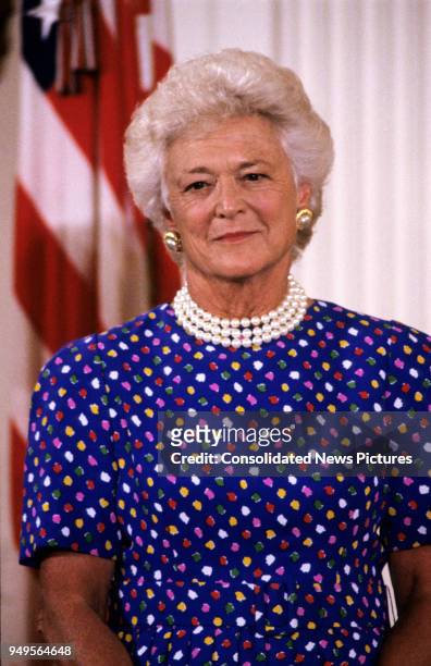 View of First Lady Barbara Bush as she hosts Presidential Medal of Freedom ceremony in the East Room of the White House, Washington DC, July 6, 1989.