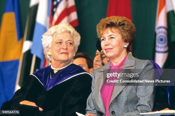 American First Lady Barbara Bush and Wife of the President of the Soviet Union Raisa Gorbachev attend graduation ceremonies at Wellesley College,...