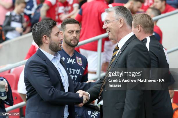 Bristol City manager Lee Johnson shakes hands with Hull City manager Nigel Atkins before the Sky Bet Championship match at Ashton Gate, Bristol.