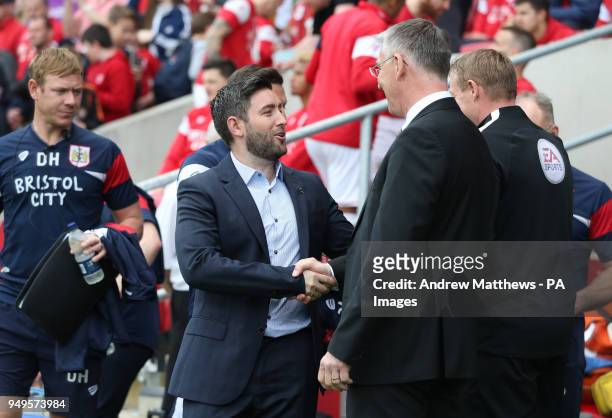 Bristol City manager Lee Johnson shakes hands with Hull City manager Nigel Atkins before the Sky Bet Championship match at Ashton Gate, Bristol.