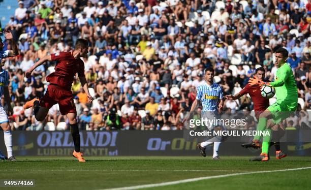 Roma's Czech forward Patrik Schick heads the ball and scores a goal past SPAL's Italian goalkeeper Alex Meretto during the Italian Serie A football...