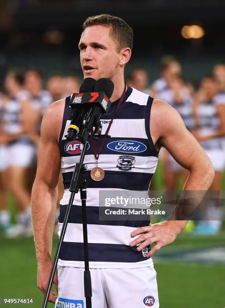 Joel Selwood of the Cats receives the Peter Badcoe Anzac day medal during the round five AFL match between the Port Adelaide Power and the Geelong...