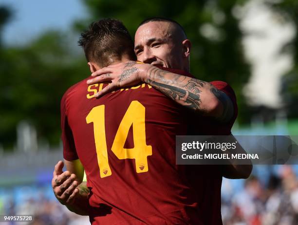 Roma's Czech forward Patrik Schick is congratulated by Roma's Belgian midfielder Radja Nainggolan after scoring a goal during the Italian Serie A...