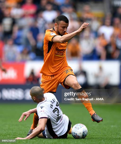 Romain Saiss of Wolverhampton Wanderers and Darren Pratley of Bolton Wanderers during the Sky Bet Championship match between Bolton Wanderers and...