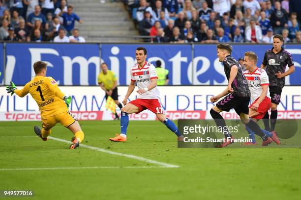 Lewis Holtby of Hamburg scores a goal to make it 1:0 during the Bundesliga match between Hamburger SV and Sport-Club Freiburg at Volksparkstadion on...