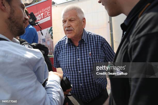 Udo Voigt, European Parliament member of the far-right NPD politicial party, speaks to the media at the venue of a neo-Nazi music fest on April 21,...