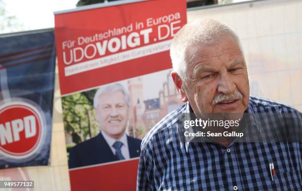 Udo Voigt, European Parliament member of the far-right NPD politicial party, speaks to the media at the venue of a neo-Nazi music fest on April 21,...