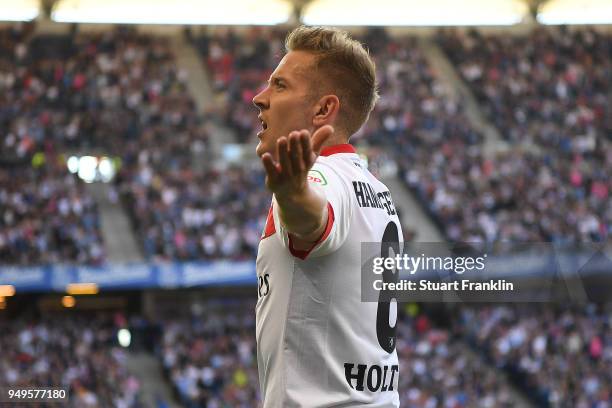 Lewis Holtby of Hamburg celebrates after he scored a goal to make it 1:0 during the Bundesliga match between Hamburger SV and Sport-Club Freiburg at...