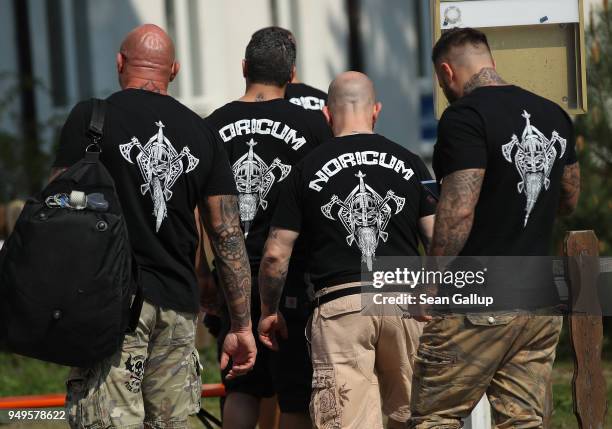 Participants wearing t-shirts that read: "Noricum" arrive for a neo-Nazi music fest on April 21, 2018 in Ostritz, Germany. By earky after noon...