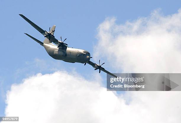 Lockheed Martin C-130J Hercules performs an aerial display at the Paris Air Show in Le Bourget, France, on Tuesday, June 16, 2009. The 48th...