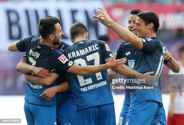 Lukas Rupp of Hoffenheim jubilates with team mates after scoring the sixt goal during the Bundesliga match between RB Leipzig and TSG 1899 Hoffenheim...