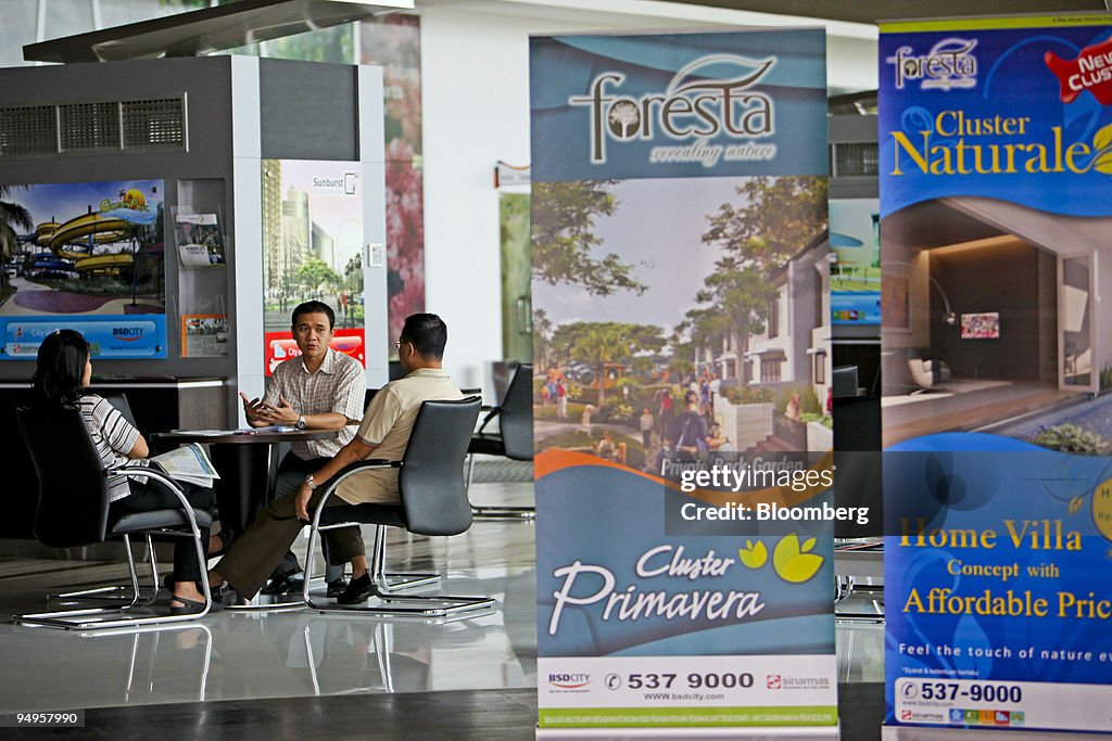 A couple visits the marketing office of PT Bumi Serpong Dama