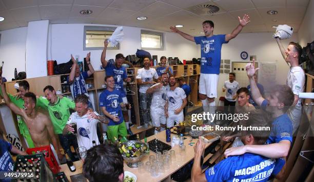 Players of 1. FC Magdeburg celebrate their promotion to Second Bundesliga after the 3. Liga match between 1. FC Magdeburg and SC Fortuna Koeln at...