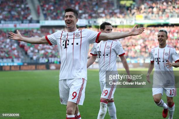 Robert Lewandowski of Munich celebrate after his first goal during the Bundesliga match between Hannover 96 and FC Bayern Muenchen at HDI-Arena on...
