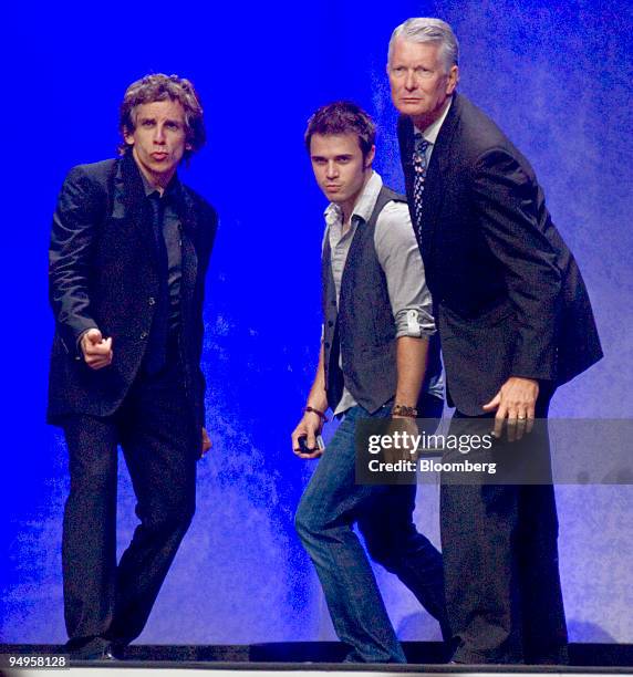 Actor Ben Stiller, left, American Idol Season 8 winner Chris Allen, center, and Tom Schoewe, chief financial officer of Wal-Mart Stores Inc., act out...