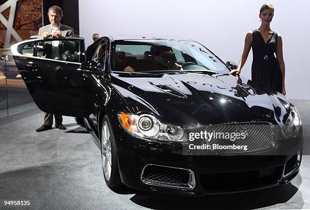 Jaguar XF automobile sits on display on the second press day of the Frankfurt Motor Show, in Frankfurt, Germany, on Wednesday, Sept. 16, 2009. The...