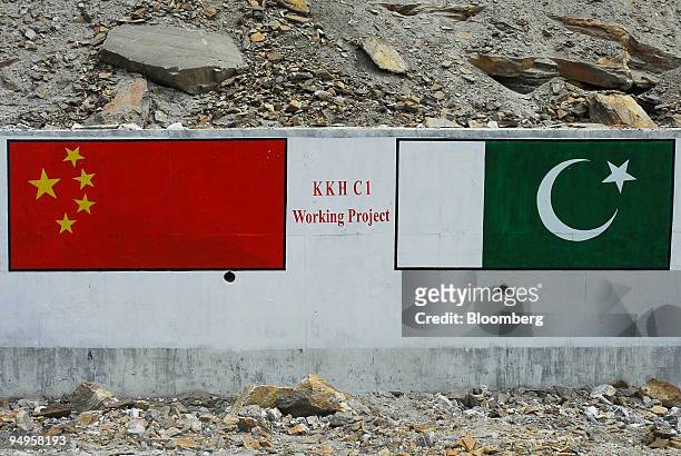 The Chinese and Pakistani flags are depicted on a section of the Karakoram highway near Khunjerab, Pakistan, on Thursday, June 25, 2009. Pakistan has...