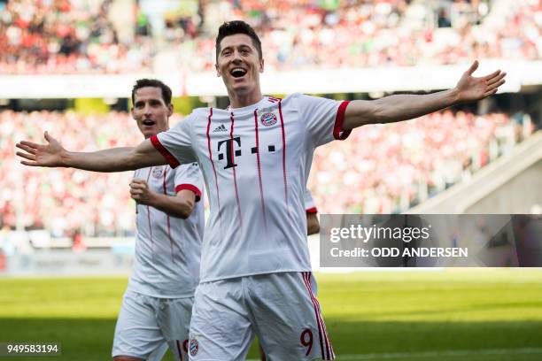 Bayern Munich's Polish forward Robert Lewandowski celebrates scoring his teams second goal during the German first division Bundesliga football match...