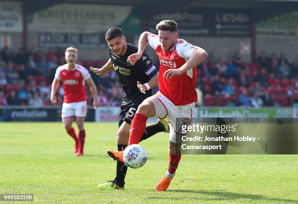Fleetwood's Wes Burns battles with Wigan's Sam Morsy during the Sky Bet League One match between Fleetwood Town and Wigan Athletic at Highbury...