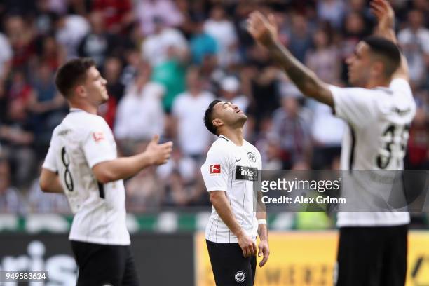 Luka Jovic, Marco Fabian and Omar Mascarell of Frankfurt react during the Bundesliga match between Eintracht Frankfurt and Hertha BSC at...