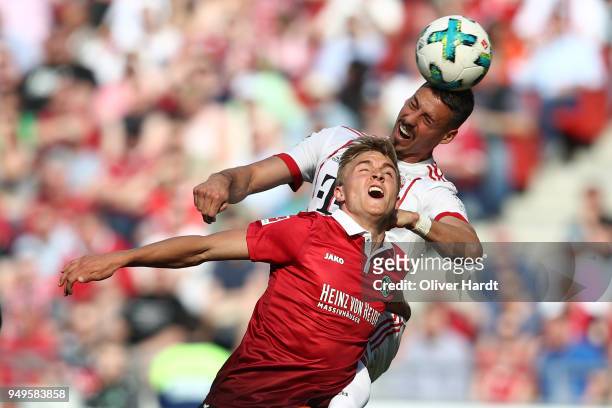 Timo Bernd Huebers of Hannover and Sandro Wagner of Munich compete for the ball during the Bundesliga match between Hannover 96 and FC Bayern...