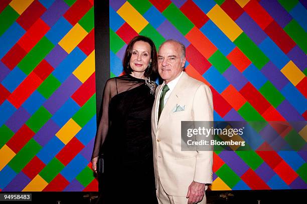 Henry Kravis, founding partner of Kohlberg Kravis Roberts & Co. , right, arrives with his wife Marie Josee Kravis for the Museum of Modern Art's...