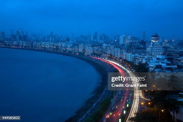 beach area where people go for walks and meet. - mumbai business stock pictures, royalty-free photos & images